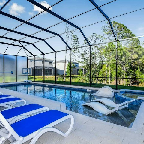 Find a moment to relax and unwind by the private pool