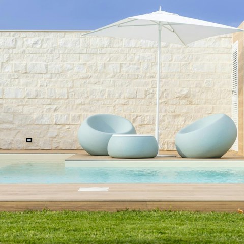 Rest up on the sun chairs after a dip in the pool
