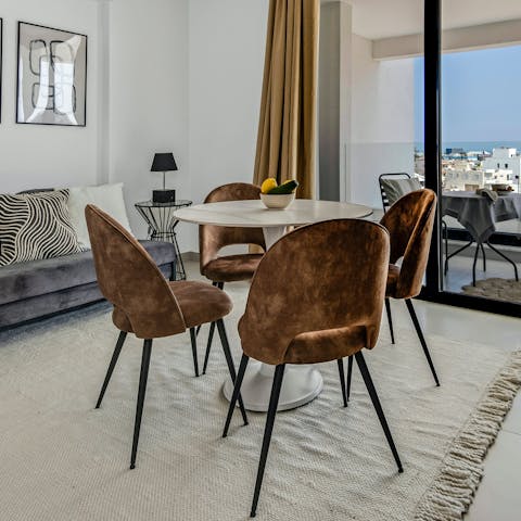 Enjoy breakfast at the dining table before driving to the beach