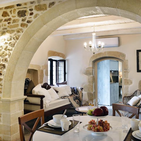 Make yourself at home in the cosy living area bursting with traditional character