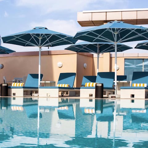 Grab a prime spot by the stunning outdoor pool
