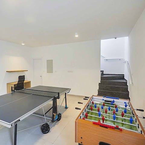 Challenge friends and family to some games in the recreation room