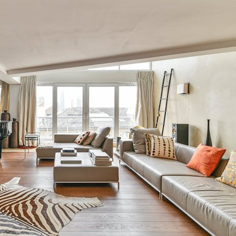 Unwind in the loft-like lounge brimming with natural light