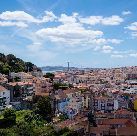 Take in views over Lisbon from Miradouro da Graça nearby