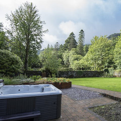 Soak under the stars in the bubbling hot tub
