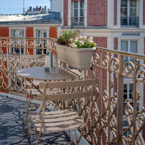 Watch the world go by from the private balcony
