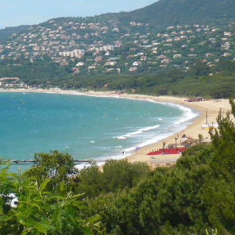 Stroll down the path straight to the Plage du Débarquement beach