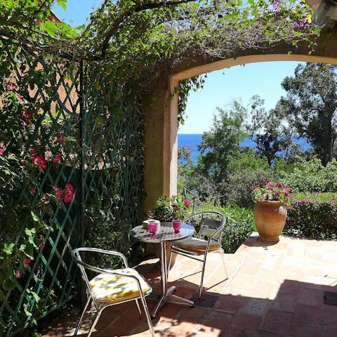 Drink your morning coffee on the sun-dappled patio