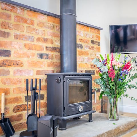 Warm up in front of the log burner after a wintry walk