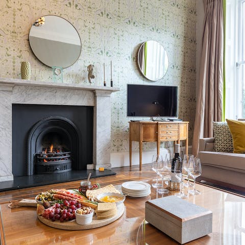 Enjoy cheese and wine around the fire on chilly evenings