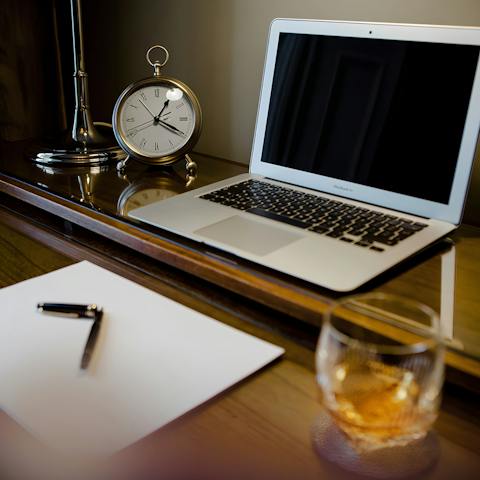 Work from home and catch up on emails at the antique desk