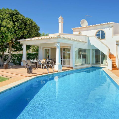 Cool off with a refreshing dip in the private, outdoor pool
