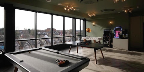 Gather in the communal games room for ping pong and pool