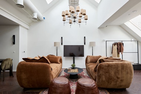 Relax in a living space crowned by soaring skylights