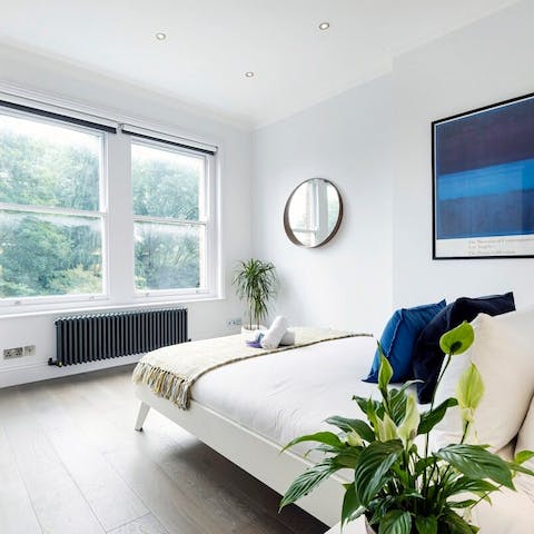 Unwind in the bright, zen-like bedrooms after a busy day