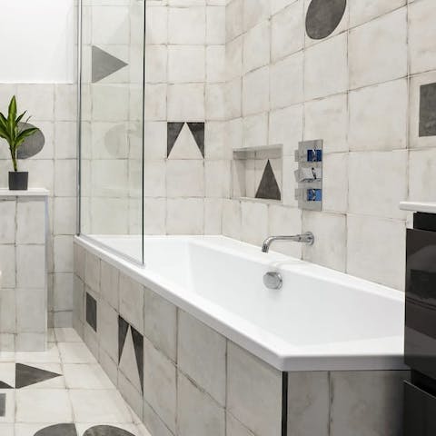 Soak your muscles in the modern tub after a long day out exploring the city