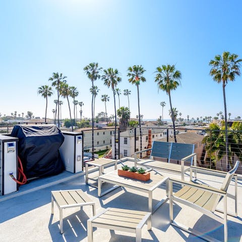 Fire up the grill on the ocean view roof terrace