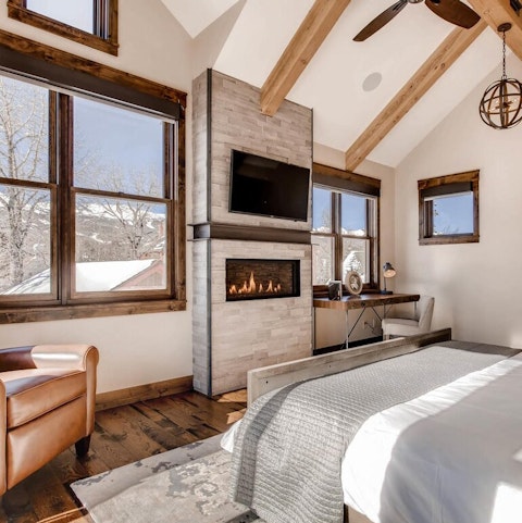 Wake up to mountainous views and a cosy fire