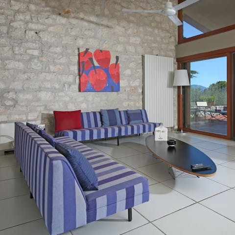 Gather in the stylish living space for a daily debrief