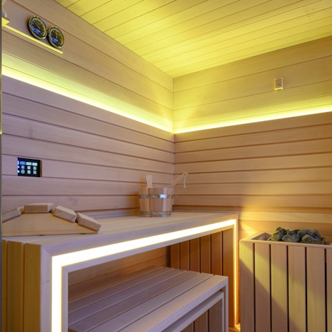 Unwind in the private spa, complete with sauna and heated pool