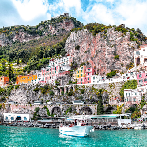 Explore the Amalfi Coast, including Spiaggia del Cavallo Morto and Maiori Port