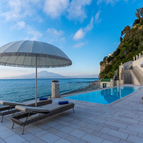 Admire the sea view from the private infinity pool