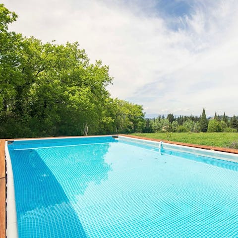 Slip into the big swimming pool and cool off