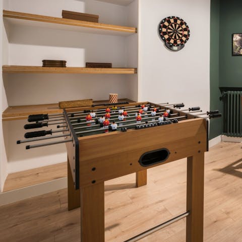Challenge friends or family to a game of table football