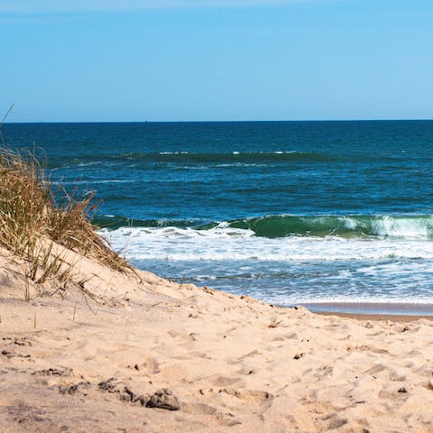 Drive eleven minutes to Two Mile Hollow Beach and sprawl out in the sand