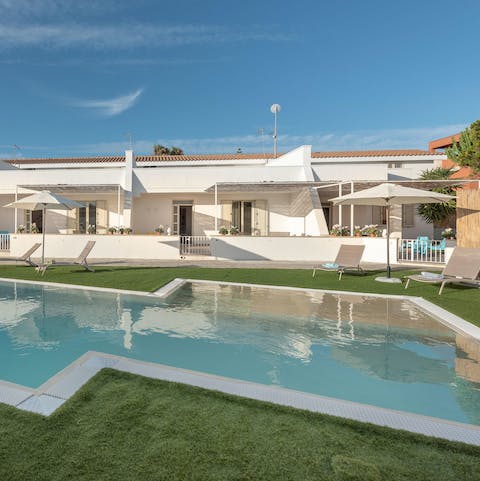 Make poolside lounging here your only firm plan for the day