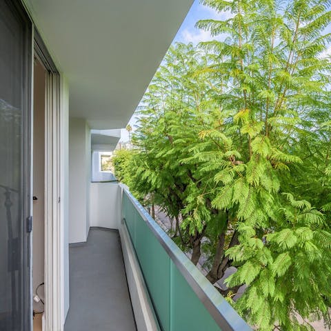 Enjoy a sundowner on your shady balcony