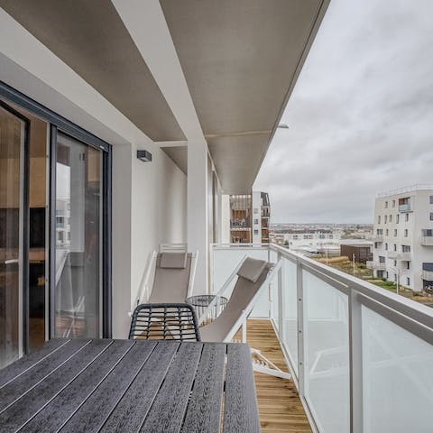 Enjoy fresh coffee and croissants each morning on the private balcony