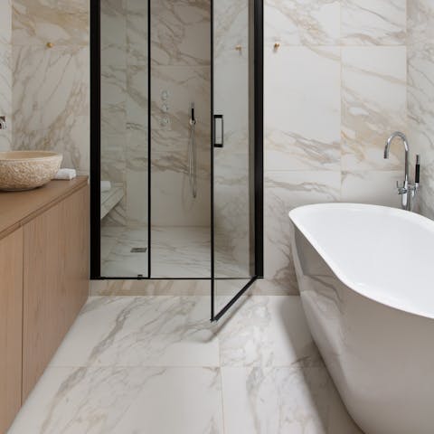 Soak in the freestanding tub to unwind after a busy day