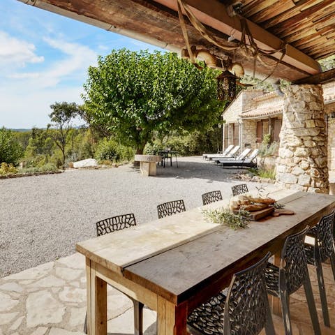 Eat outside on the terrace with views across the valley