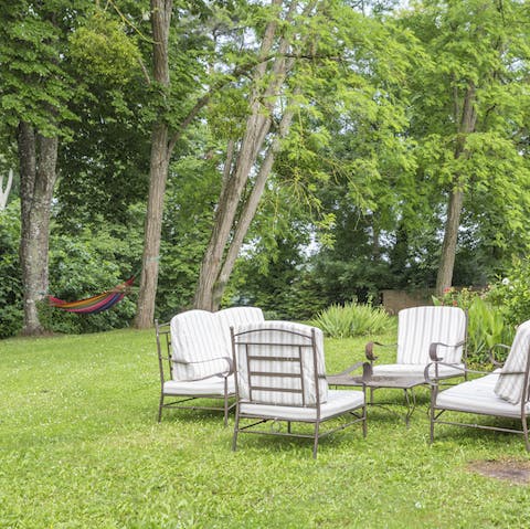 Sit back and relax in three acres of private gardens and established woodlands