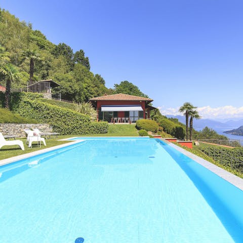 Swim laps of the grand, garden swimming pool