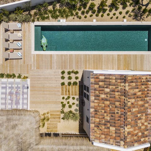 Make morning laps of the private pool the new routine