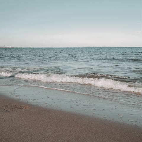 Swim in the Aegean Sea at Livadi Beach, only a five-minute stroll from here