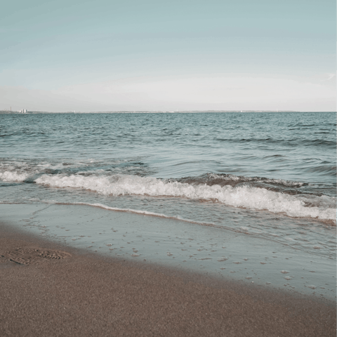 Swim in the Aegean Sea at Livadi Beach, only a five-minute stroll from here