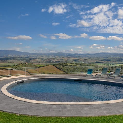 Swim in the pool as you drink in the far-reaching views