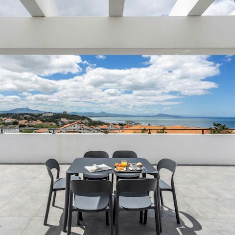 Relax on the balcony and soak up the sea view