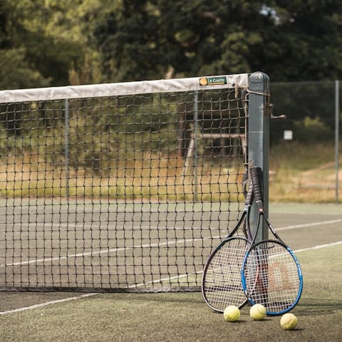 Practise your serve on the shared tennis court