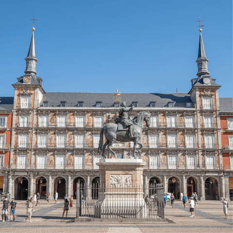 Visit bustling Plaza Mayor, easily reachable on foot