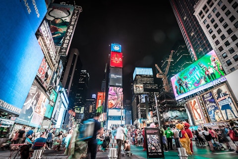 Experience Times Square's dazzling neon energy at the heart of Manhattan, a thirty-two-minute walk