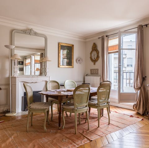 Enjoy brie and wine around the dining table