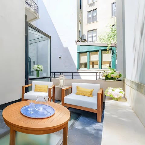 Sip a glass of something chilled on the private terrace