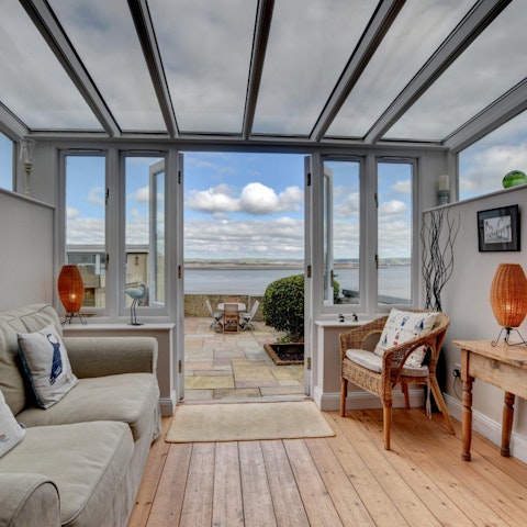 Open the patio doors and enjoy the rejuvenating spirit of coastal living