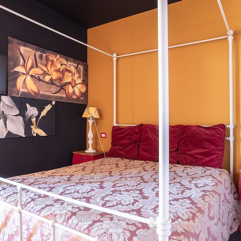 Snuggle into the four-poster bed