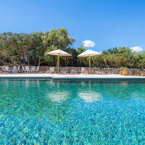 Splash about in the large swimming pool and enjoy the mountainous views