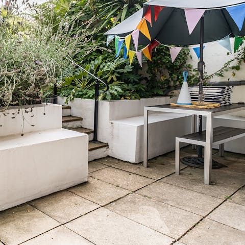 Dine alfresco in the courtyard with a homecooked meal